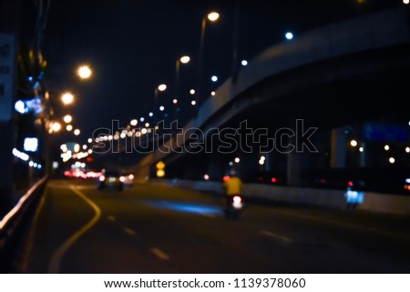 Transportation at night in city Bangkok blurred