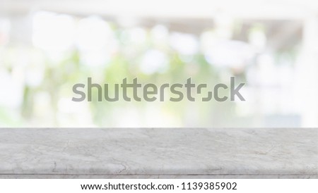 Empty white marble Stone table top and blurred restaurant interior banner background - can used for display or montage your products.