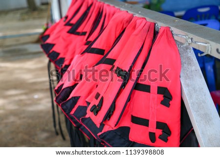 life jacket hanging for tourist services.