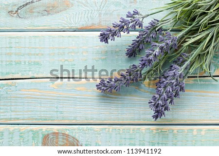 Flowers on vintage wood background