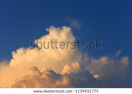 Cumulus at sunset. Sky and clouds background.