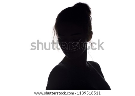 silhouette of a young woman with hairdo, beautiful girl on a white isolated background, concept beauty and fashion