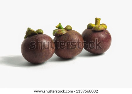close-up view of fresh Thailand mangosteen isolated on white background.