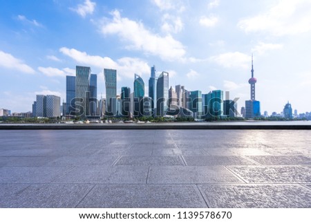 empty square with panoramic city skyline in shanghai china