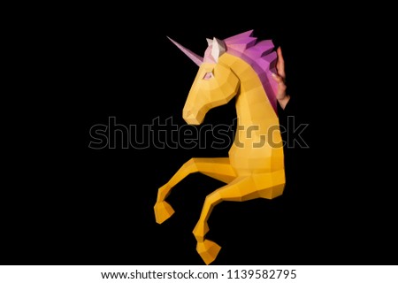 Hands hold unicorn. Artwork. 3d model unicorn papercraft. Copy space