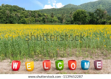 Welcome sign, flower natural background 