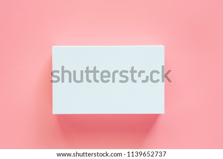 Blank business cards on pink background