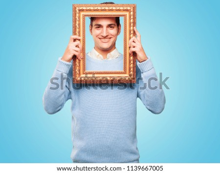 young handsome tanned man with a frame