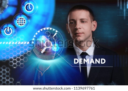 Business, Technology, Internet and network concept. Young businessman working on a virtual screen of the future and sees the inscription: Demand