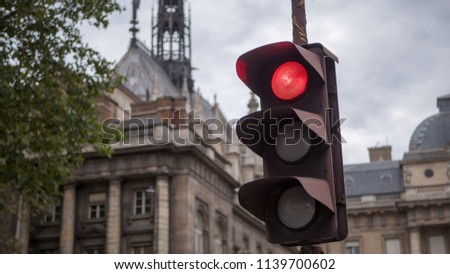 Red traffic light in Paris France