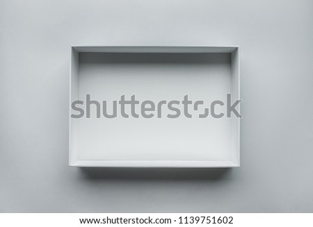 White box open on table.top view.real photo,still life