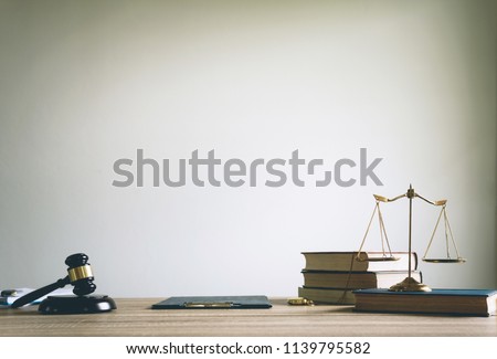 working space of lawyer with law gavel ,legal book and brass scale of judge. lawyer and law ,judiciary and legislature courtroom legal concept. top view flatlay lawyer background.