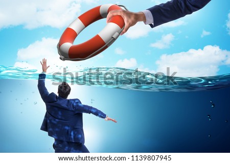 Businessman being saved from drowning Royalty-Free Stock Photo #1139807945