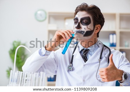 Scary monster doctor working in lab Royalty-Free Stock Photo #1139809208