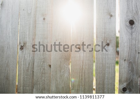 sun in the fence
