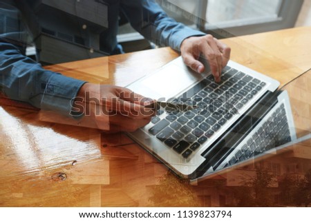 Man Writing with document at work office