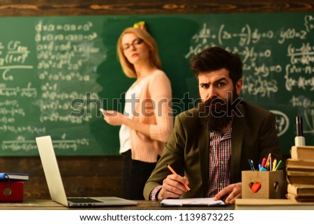 Teacher drawing at classroom in school, University students studying with books in library, Education is to teach one to think intensivelyTutors and students prefer formal environment