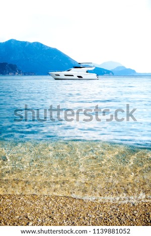 yacht  through clear waters.Sailing Boat.