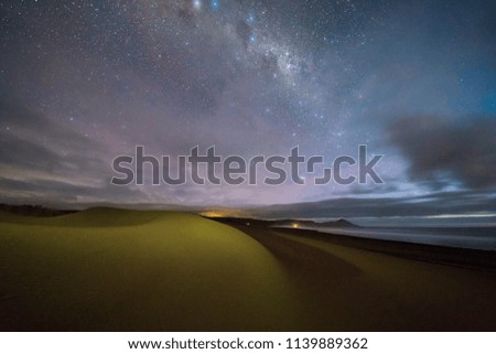 The Milky Way rises below the horizon at "Topocalma" beach, Chile
