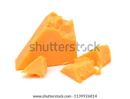 Cubes of cheddar cheese isolated on white  Royalty-Free Stock Photo #1139926814