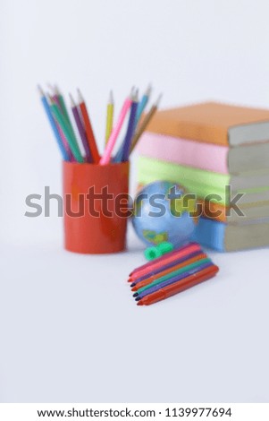 felt pens and school supplies on white background .photo with copy space