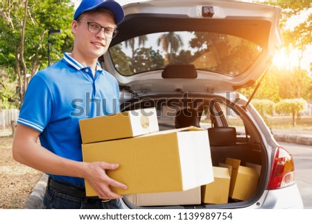 Delivery man holding package box to service delivery, delivery concept