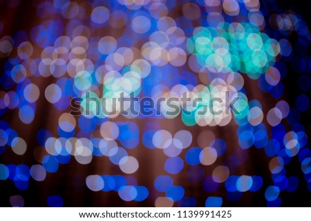 Blue and white bokeh abstract background.