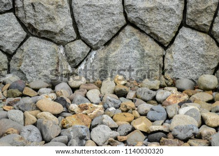 Natural Sea Stones Background. Stone Pebbles Texture. Abstract Background With Natural Pebbles. Selective Focus. Image For Templates, Placards, Banners, Presentations, Reports, Card And Wallpaper. etc