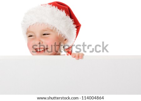 Happy Christmas child with the board on a white background.