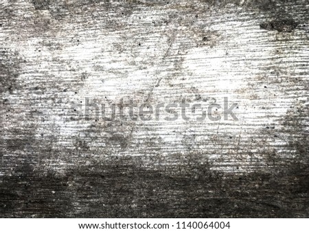 The grunge wood texture.

