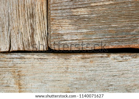 Old wooden decay textured background. The surface of rustic planks wood.