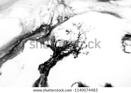 Abstract ink background. Moving liquid paint in water