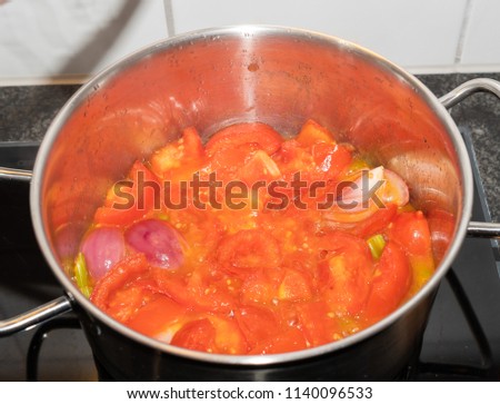 Pan with boiling tomatoe sauce, fresh Italian food