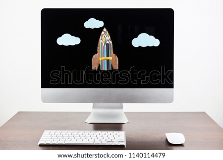 Computer with rocket on screen. Start-up concept. Back to school