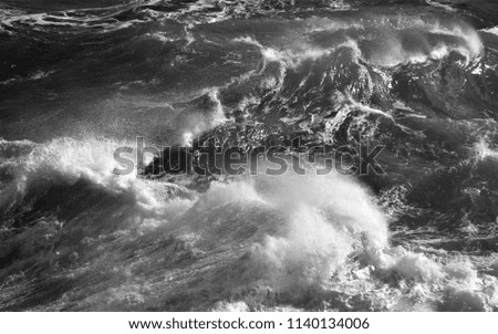 tribute to Ansel Adams,artistic black and white photography of breaking wave,  of storms with waves and wind on the north coast of Galicia,