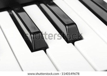 Piano keyboard of synthesizer close-up. Music concept