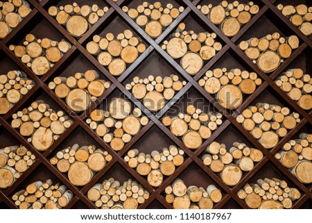 The round wood for furnace or fireplace stacked evenly.