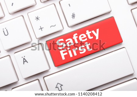 safety first on computer key showing security concept Royalty-Free Stock Photo #1140208412