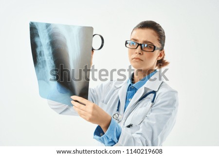   doctor with X-ray magnifier medicine traumatology                             