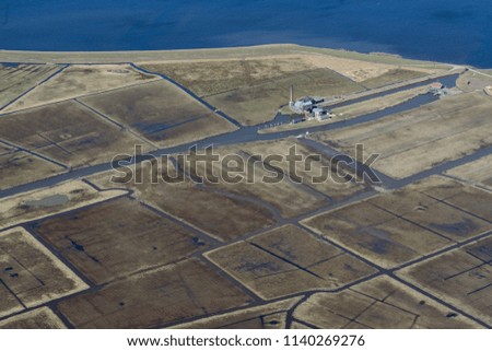 Water pumping station in Dutch landscape, top view