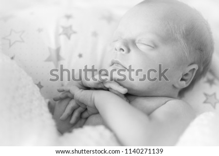 Beautiful tiny cute sleeping baby girl, Staffordshire, black and white