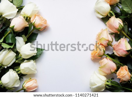 Flat lay stylish mock up photo with  roses flowers on the white background. Feminine photo for blog and website. Mock up background for a product presentation.