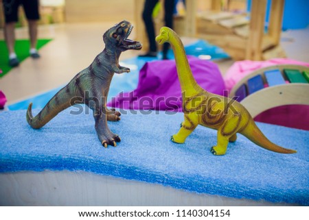 Dinosaur hunter on wild models background