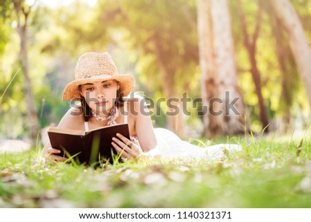 Reading a book at park