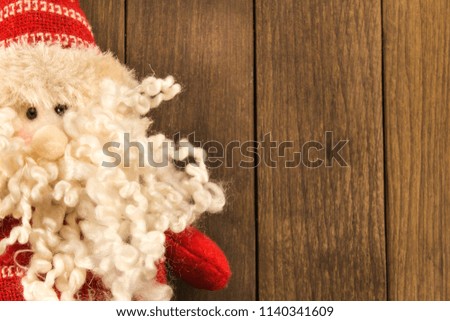 Santa Claus christmas decoration on wooden background