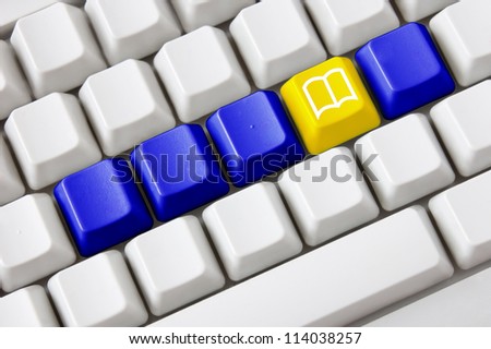 Smart keyboard with color button and book symbol. Concept