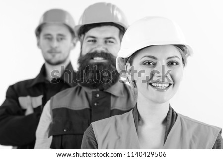 Equality of rights concept. Team of architects, builders with happy faces, isolated white background. Woman and men in hard hats stand close as team. Builder, engineer, labourer as friendly team.