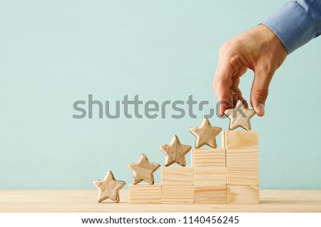 concept image of setting a five star goal.  increase rating or ranking, evaluation and classification idea Royalty-Free Stock Photo #1140456245