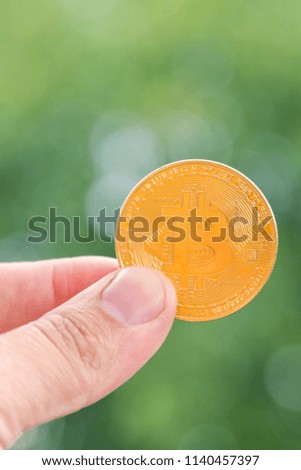 Crypto currency Bitcoin Outdoor background. vertical photo