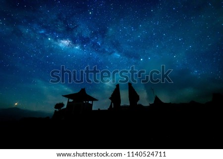 Milkyway with temple buiding silhouette.